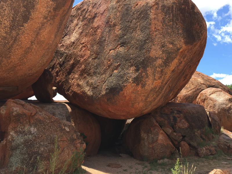 dreaming of stones what does it mean if they come towards you and crush you